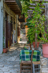 Fototapeta na wymiar The picturesque village of Makrinitsa with its architectural traditional old stone buildings located on Pelion mountain , above Volos town ,Magnisia,Greece.