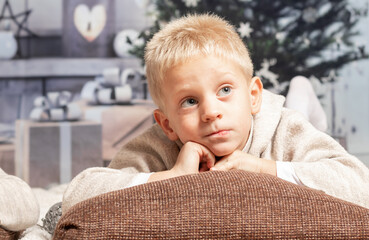 Child thinking about christmas