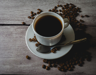 cup of coffee with beans