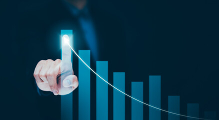 Businessman holding tablet bar graph of analytics and financial, Changes in new planning, Business...