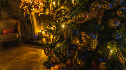 Christmas and New Year interior decoration. Green tree decorated with toys, flashing garland, illuminated lamps. Xmas tree. Cozy Christmas atmosphere