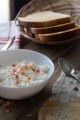 Homemade cottage cheese with candied fruits on the morning table