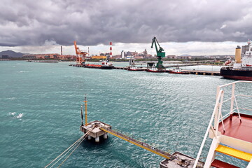 Views of the terminals, piers, cranes and various equipments in port of Cigading. Indonesia,...
