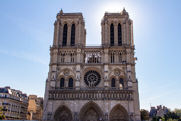 Cityscape view of the exterior stone architecture of the famous Notre Dame de Paris, including...
