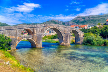 Fototapeta na wymiar Old Arslanagica Perovica bridge in city of Trebinje in Bosnia and Herzegovina.