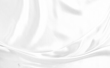 White gray satin texture that is white silver fabric silk background with beautiful soft blur pattern natural.