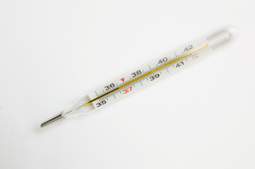 medical mercury thermometer isolated on white background. Coronavirus and isolation.
