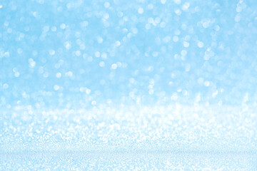 Christmas blue background with sparkles.