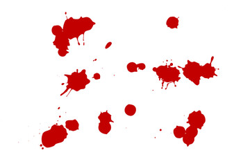 Red blot on a white background. Spots of ink on a piece of paper.