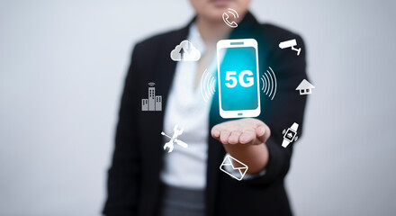 Business hold mobile phone with technology 5G of mobile telecommunication network in Europe for high speed wireless data connection to internet from smartphones, future technology 5G network.