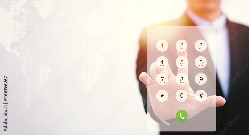 Poster dialing on virtual telephone keypad with transparent telephone buttons, businessman touch button of 