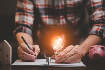 thinking and creative concept, Close up light bulb and working on the desk, Creativity and...