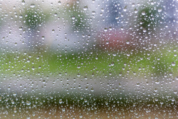 drops of water on a glass in a rainy day