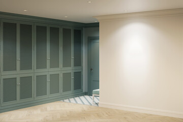 Entrance hall with a large green wardrobe, a bench near the front door, a blank beige wall illuminated with a spotlight, a ceiling with built-in lights, a parquet floor. 3d render