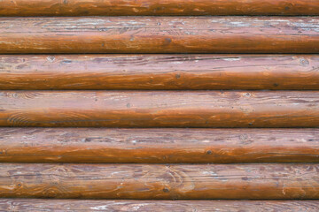 Background from wooden beams. The wall is made of wood.