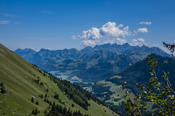 Naklejka premium Picturesque views of the Alps from the pass Col de Jaman. The Col de Jaman (1,512 m) -a mountain pass in the western Swiss Alps. Canton of Vaud, Switzerland.