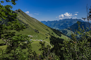 Obraz premium Picturesque views of the Alps from the pass Col de Jaman. The Col de Jaman (1,512 m) -a mountain pass in the western Swiss Alps. Canton of Vaud, Switzerland.