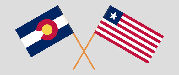 Crossed flags of The State of Colorado and Liberia. Official colors. Correct proportion