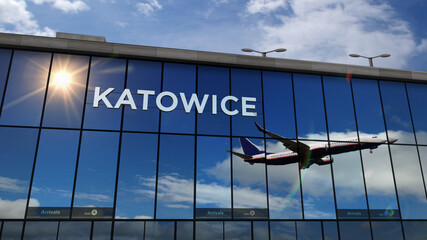 Airplane landing at Katowice Poland airport mirrored in terminal