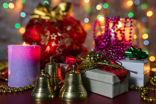 christmas bells with gift boxes and lights