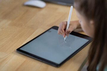 Little Child Girl Painting On Digital Tablet