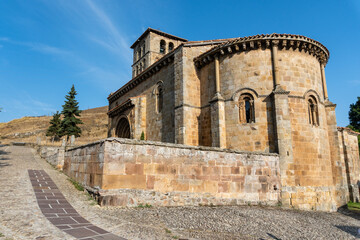Fototapeta na wymiar Collegiate Church of San Pedro de Cervatos is a Romanesque Catholic temple located in Cervatos, at municipality of Campoo de Enmedio, Cantabria, Spain.