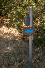 Blue Arrow on a Hiking Trail Sign