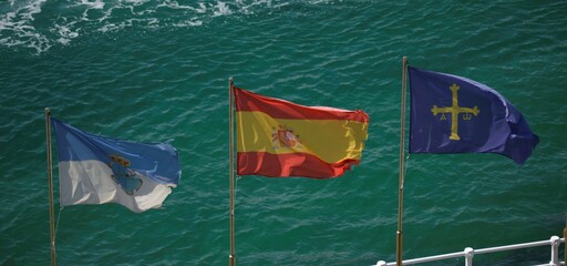 Flags in the beach of Ribadesella, Asturias,  Spain 