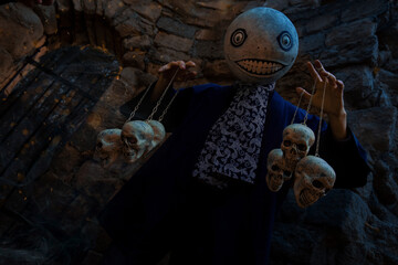 dark epic fantasy gothic style cosplay by person in hand made costume with hear and creepy smile,...