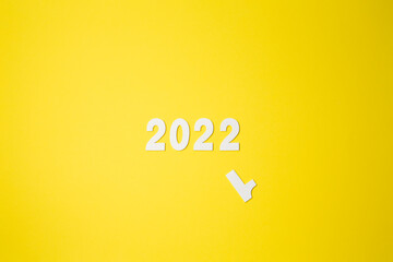 Goodbye, 2021, Happy New Year 2022, inscription. 2021 and 2022 on a yellow background. New 2022 to replace the concept of 2021