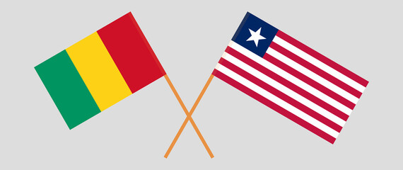 Crossed flags of Guinea and Liberia. Official colors. Correct proportion