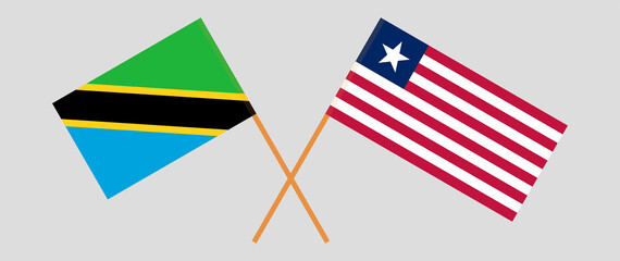 Crossed flags of Tanzania and Liberia. Official colors. Correct proportion
