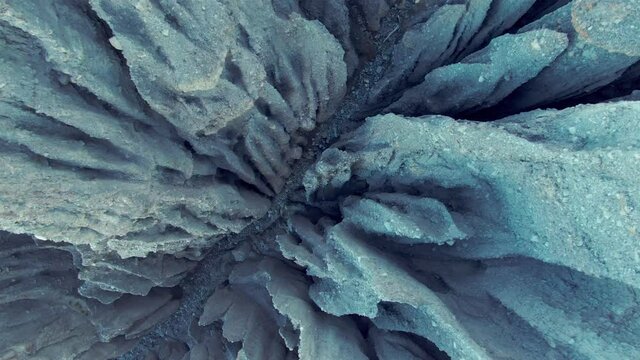 Aerial: Tightly packed cluster of ancient gravel spires at Putangirua Pinnacles, Cape Palliser, New Zealand