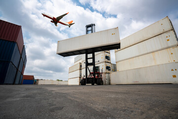 Cargo container for overseas shipping in shipyard with airplane in the sky . Logistics supply chain...