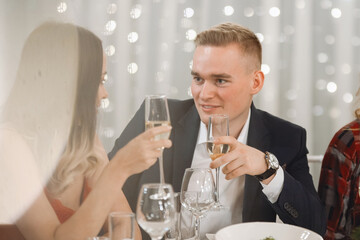 Young couple at the holiday table.
