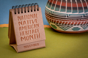 November - National Native American Heritage Month, handwriting in a desktop calendar with ceramic...