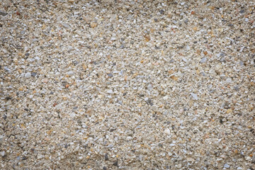 weathered wall cement until grains of sand are visible or concrete has decayed, texture abstract background