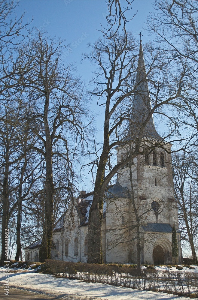 Poster Kabile village lutheran church in sunny winter day, Latvia.