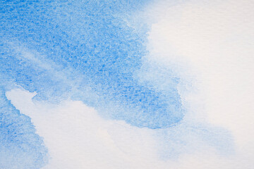 Abstract blue watercolor on white background.