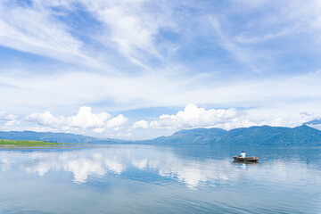 Lago de Yojoa. The largest lake in Honduras. Man fishing.
