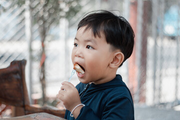 boy eating bread