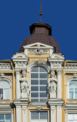 Sculptures of facade of old building in Kyiv, Ukraine