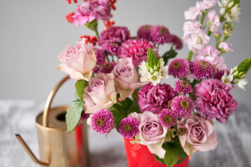Finished flower arrangement in a vase for home. Flowers bunch, set for interior. Fresh cut flowers for decoration home. European floral shop. Delivery fresh cut flower.
