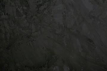 rough plastered textured wall black background backdrop