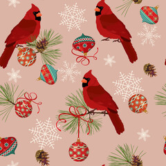 Christmas background with fir branches, bird cardinal and New Year's toys on a pink background.