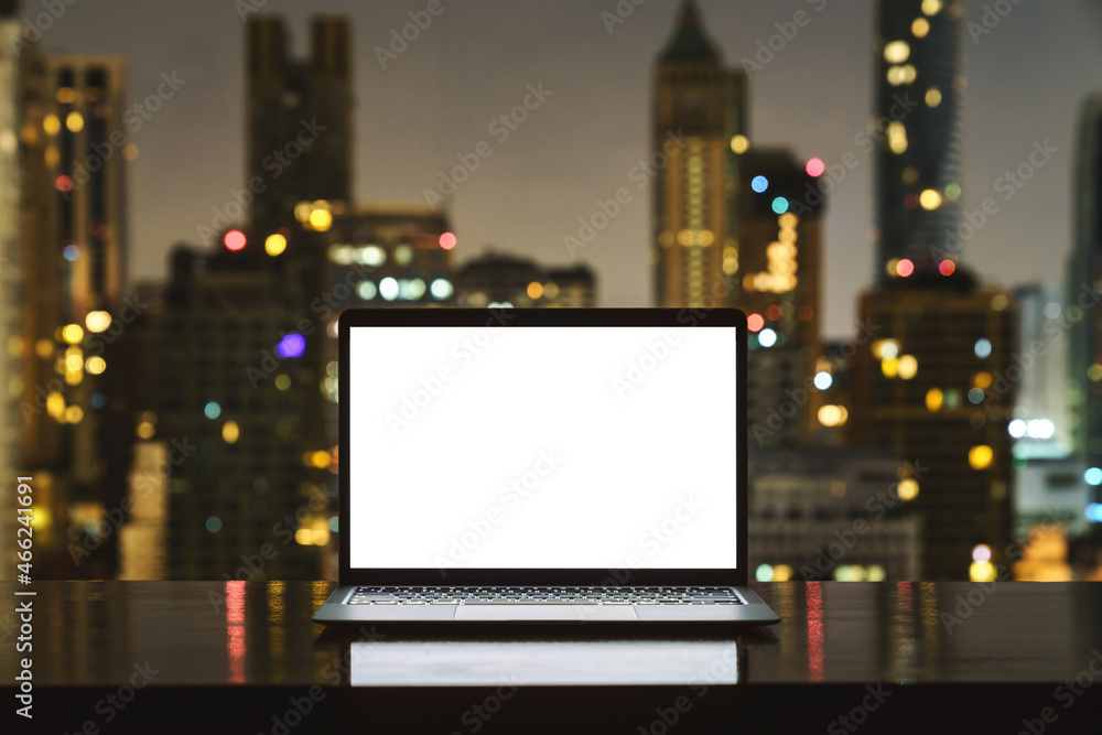 Aufkleber laptop computer on workspace white blank screen display city on