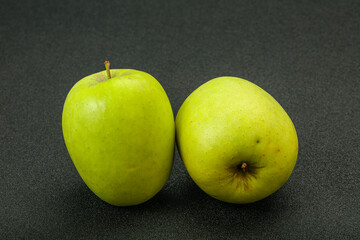 Two ripe green sweet apples