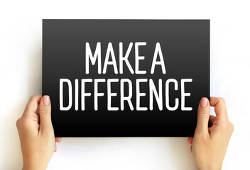 MAKE A DIFFERENCE text on card, concept background
