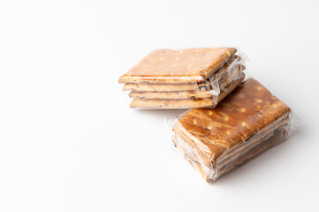 separately portioned biscuits on a white background, empty space for text
