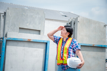 Woman construction engineer at construction site